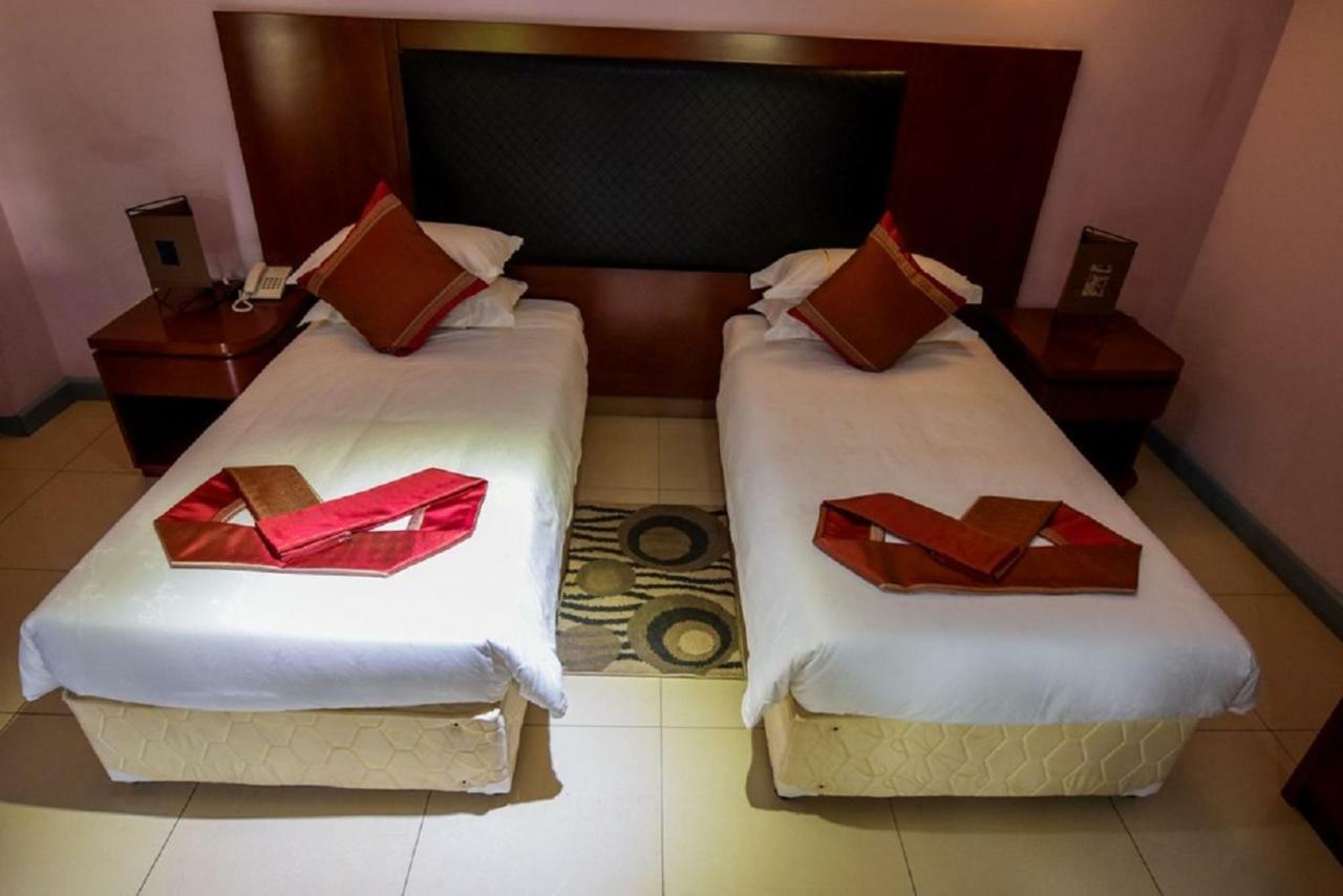 Orient Park Hotel Kigali Buitenkant foto